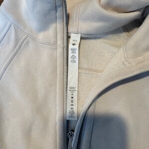 Cream Lululemon scuba half zip sweatshirt